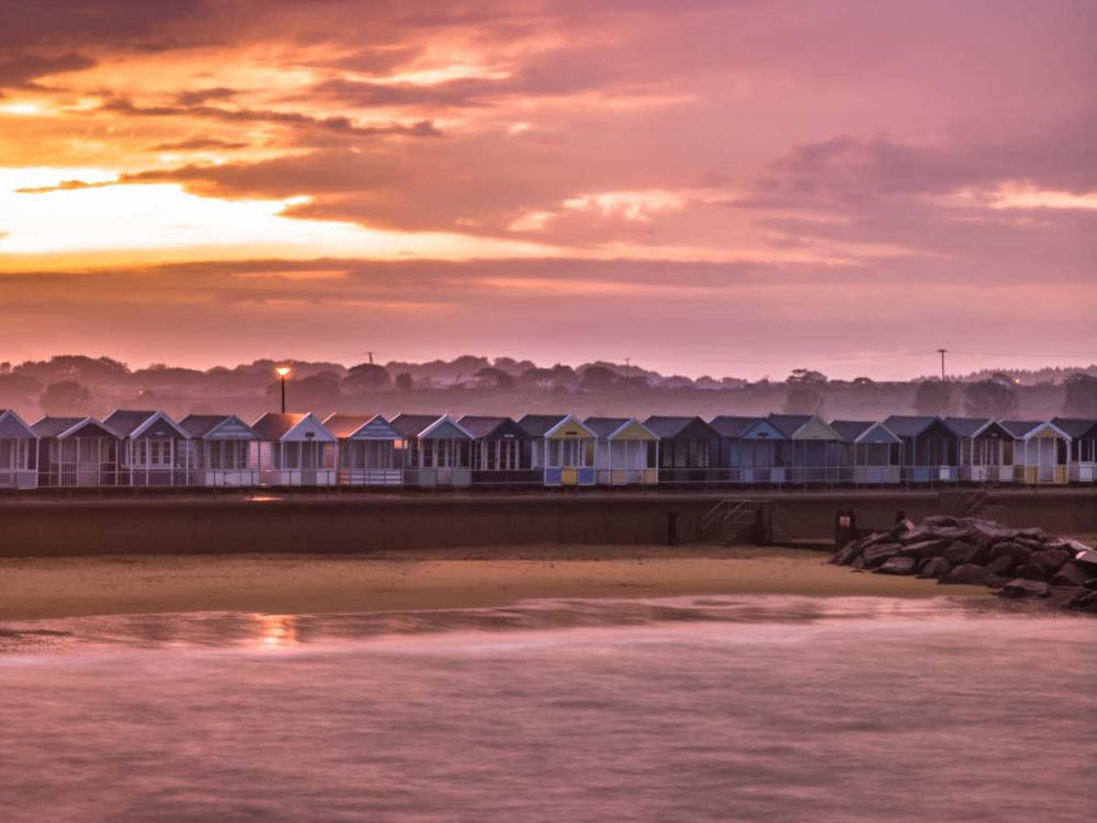 Multi coloured beach huts in a row art print by Assaf Frank for $57.95 CAD