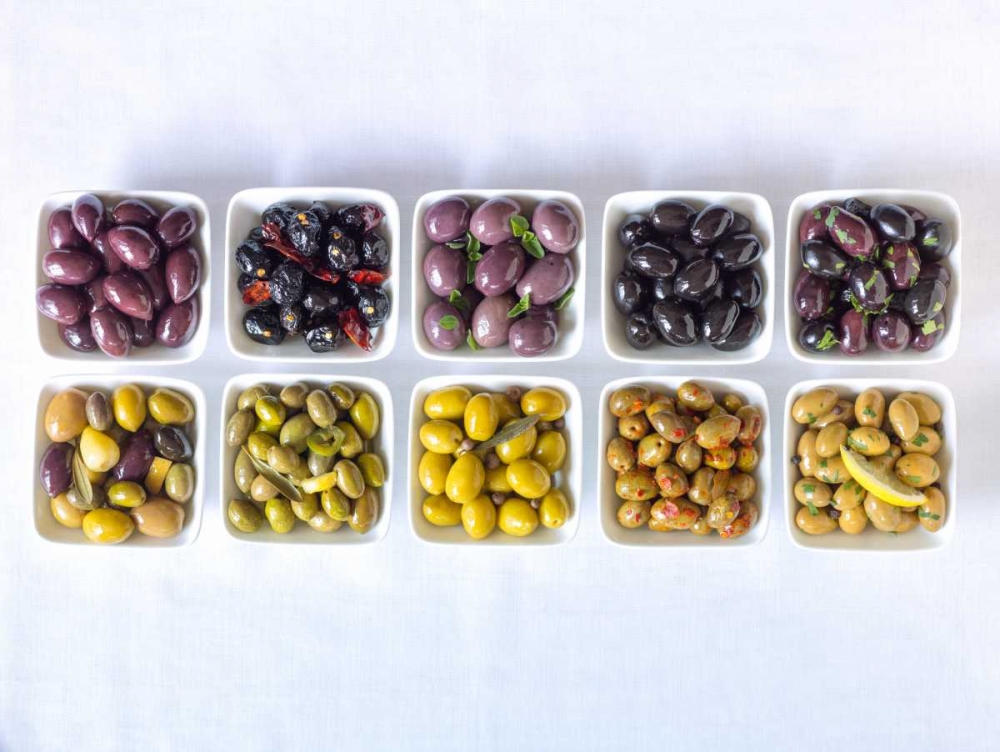 Varieties of Olives in bowls on white background art print by Assaf Frank for $57.95 CAD