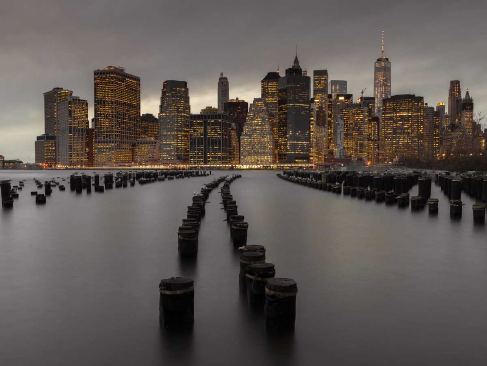 Manhattan skyline with rows of groynes in East river, New York art print by Assaf Frank for $57.95 CAD