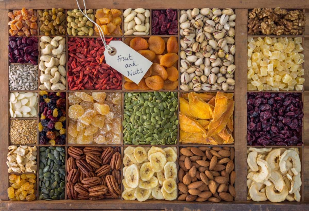 Assorted dry fruits in a wooden box art print by Assaf Frank for $57.95 CAD