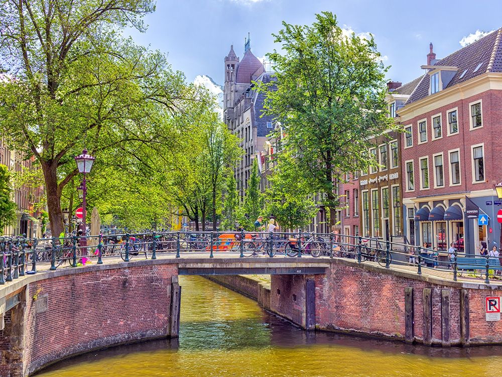 Canal through Amsterdam city art print by Assaf Frank for $57.95 CAD