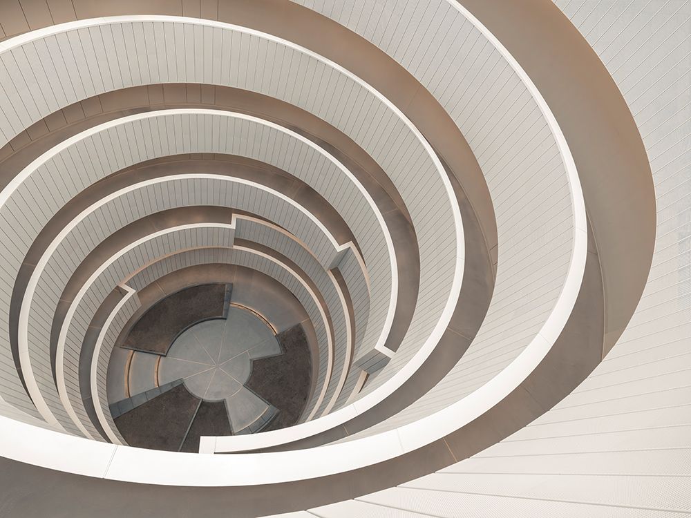 Spiral staircase inside a modern building art print by Assaf Frank for $57.95 CAD
