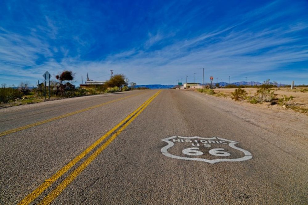 Route 66 With Clouds art print by Susan Vizvary for $57.95 CAD