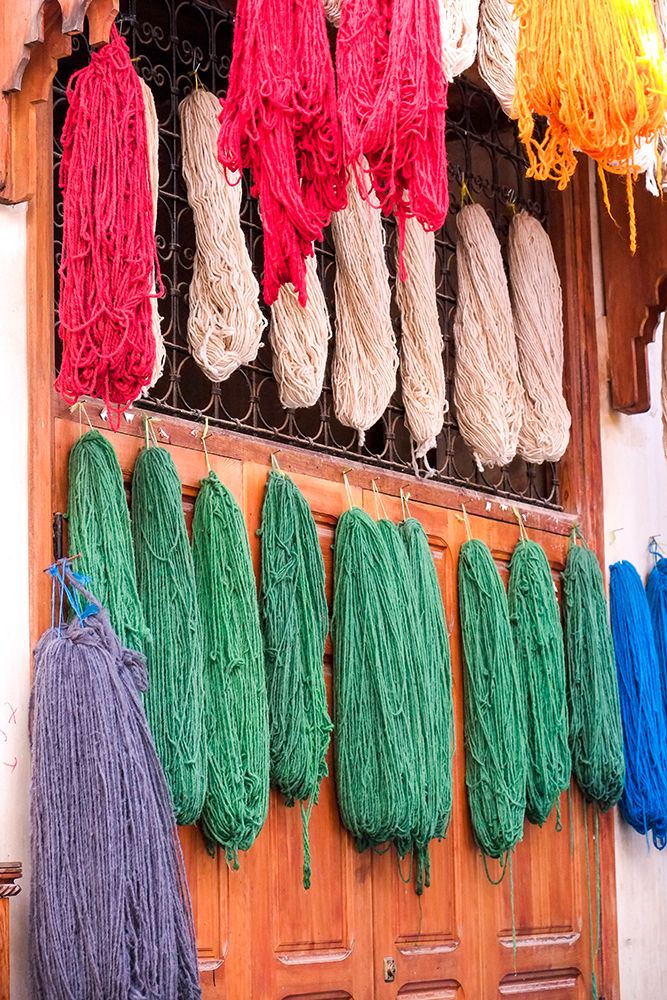 Fes-Morocco Skeins of yarn hang to dry after being hand dyed art print by Julien McRoberts for $57.95 CAD