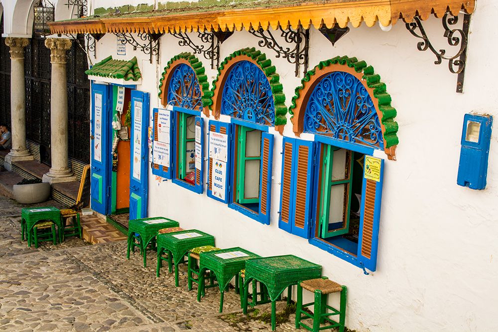 Outdoor cafe along a narrow street in the Bab Haha district of Kasbah, Old Medina, Tangier, Morocco art print by Michael DeFreitas for $57.95 CAD