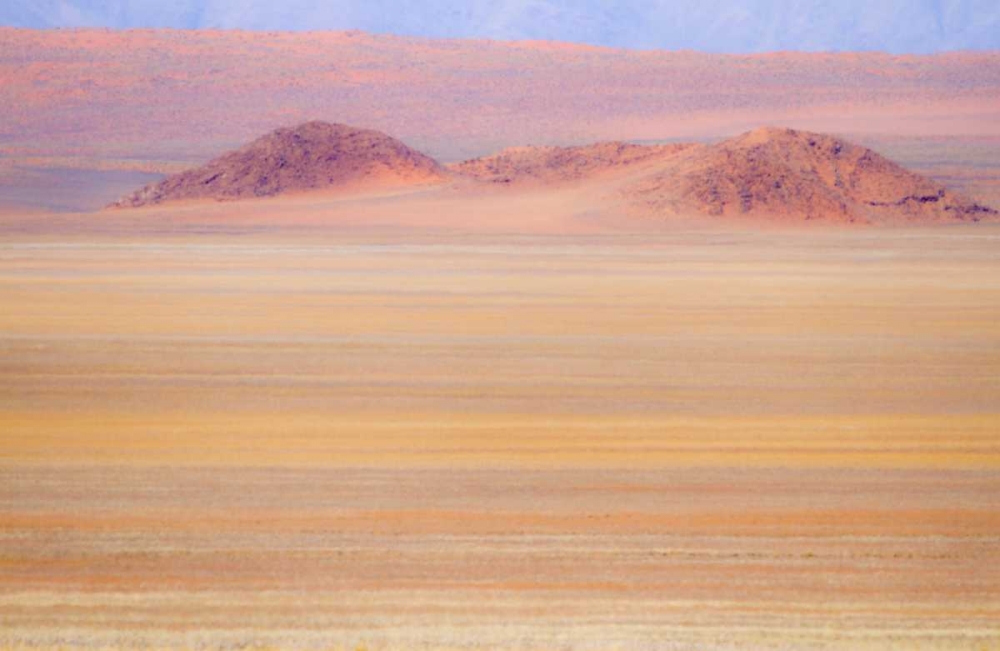 Namibia Heat distorts grassy plain and dunes art print by Bill Young for $57.95 CAD