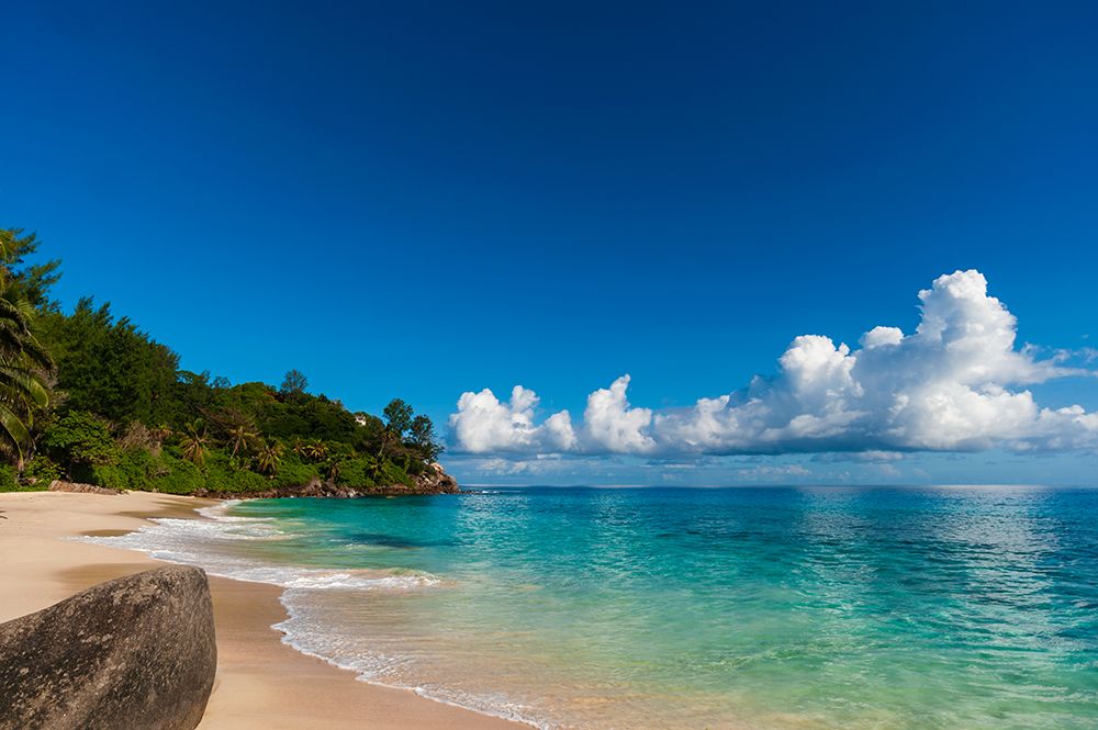 Cumulus clouds off the shore of a pristine tropical beach Mahe Island-The Republic of Seychelles art print by Sergio Pitamitz for $57.95 CAD