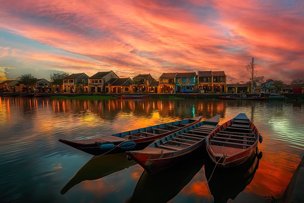 Moored boats in lake and village buildings. (AI Generated) art print by Jim Zuckerman for $57.95 CAD