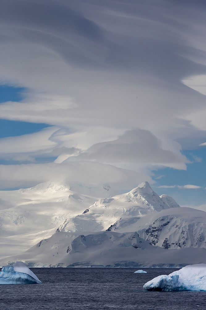 Southern Ocean, Antarctica, Northwest Peninsula. View of the mountains and the lenticular clouds. art print by Ellen B. Goff for $57.95 CAD