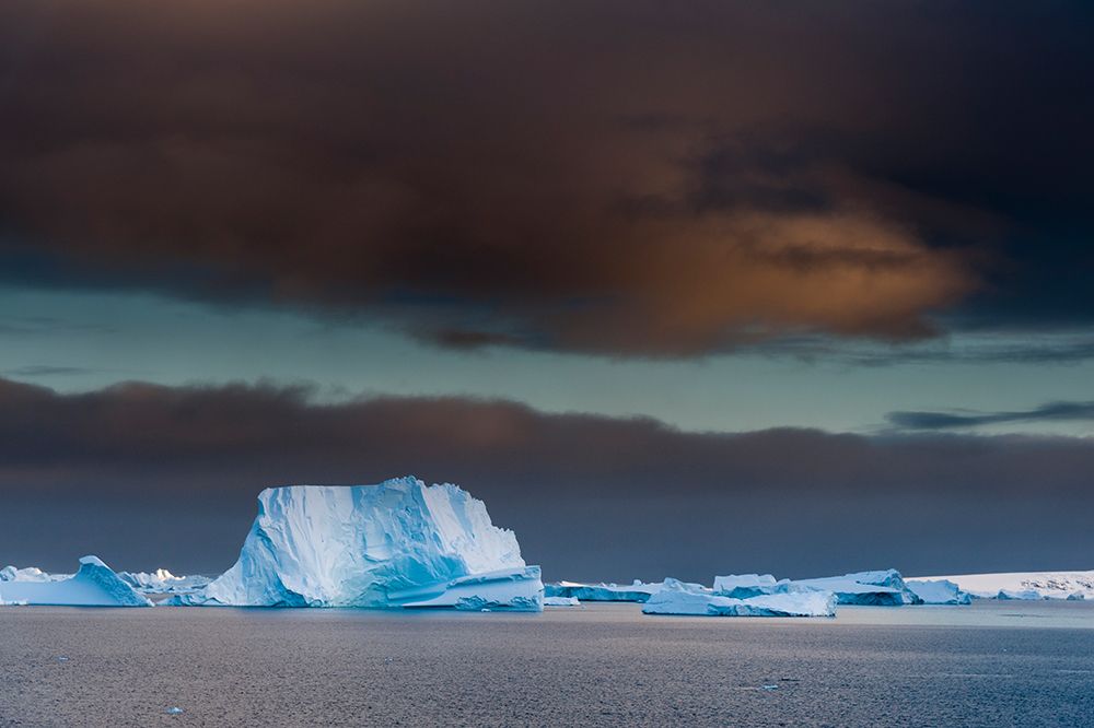 Icebergs under a stormy sky-Lemaire channel-Antarctica art print by Sergio Pitamitz for $57.95 CAD