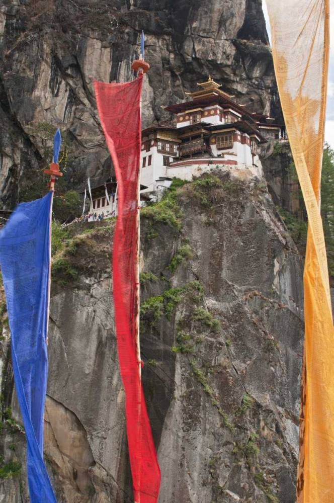 Bhutan Prayer flags hang near Taktshang art print by Dennis Kirkland for $57.95 CAD