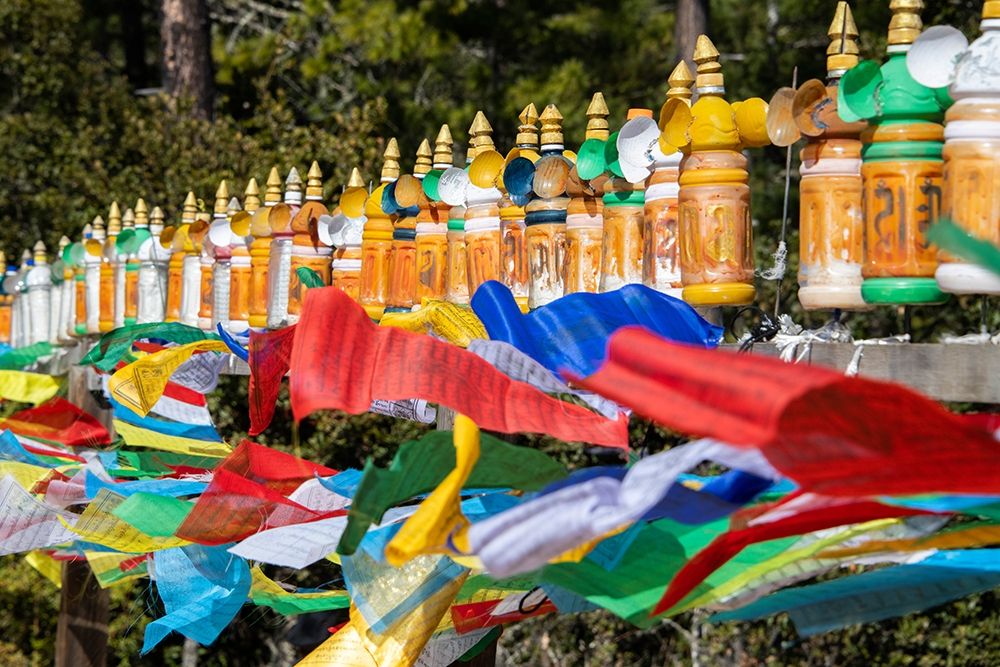 Bhutan-Paro Colorful prayer wheels and flags along the hiking trail to the Tigers Nest Monastery art print by Cindy Miller Hopkins for $57.95 CAD
