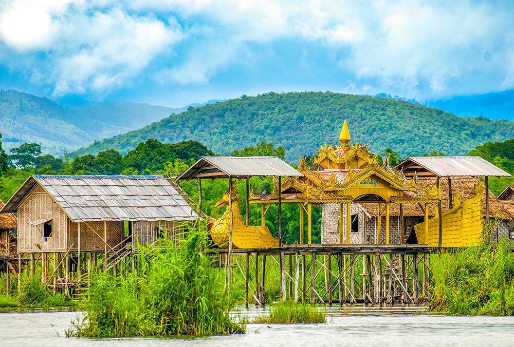 Inle Lake, Myanmar. Golden Karaweik boat which sails during Phaung Daw Oo festival. art print by Murray McCallum for $57.95 CAD