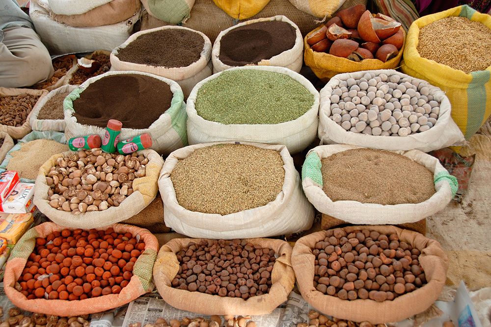 Assorted spices sold at an open market at the village fair-known as Haat-Nagpur-Maharashtra-India art print by Majority World CIC for $57.95 CAD