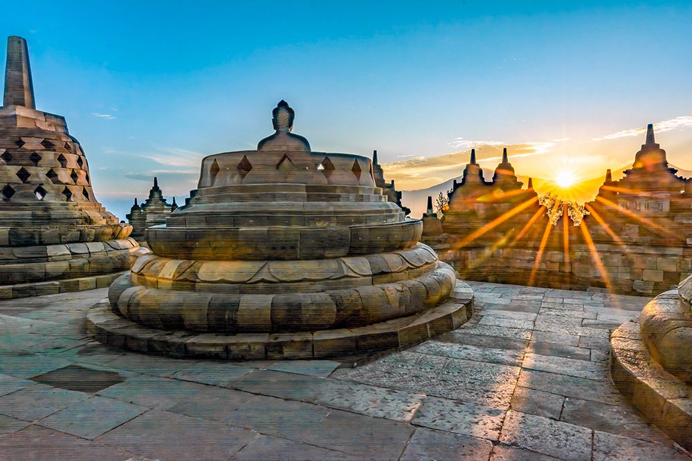 Java, Indonesia. Sunrise over Borobudur Temple, the largest Buddhist Temple in the world. art print by Murray McCallum for $57.95 CAD