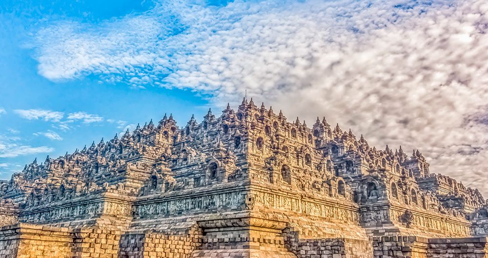 Java, Indonesia. Panorama view of Borobudur Temple, the largest Buddhist Temple in the world. art print by Murray McCallum for $57.95 CAD