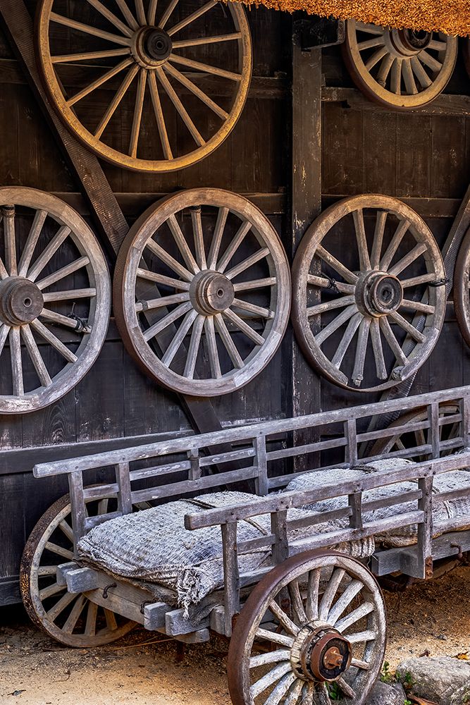 Wooden wagon wheels, Old Yoshimaya house, Hida No Sato, Hida Folk Village, Takayama, Japan art print by Jim Engelbrecht for $57.95 CAD