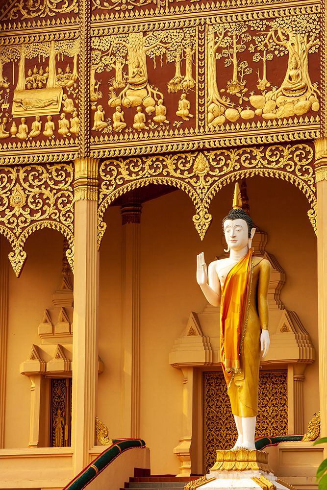 Statue Wat That Luang Neua temple in Lao-Capital of Laos-Southeast Asia art print by Tom Haseltine for $57.95 CAD