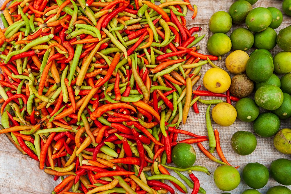 Peppers and limes at market-Vientiane-Capital of Laos-Southeast Asia art print by Tom Haseltine for $57.95 CAD