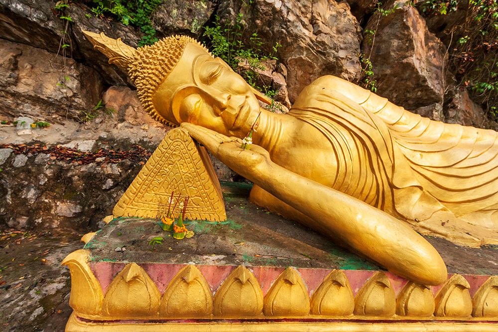 Laos- Luang Prabang. Reclining Buddha statue on Mount Phousi. art print by Tom Haseltine for $57.95 CAD
