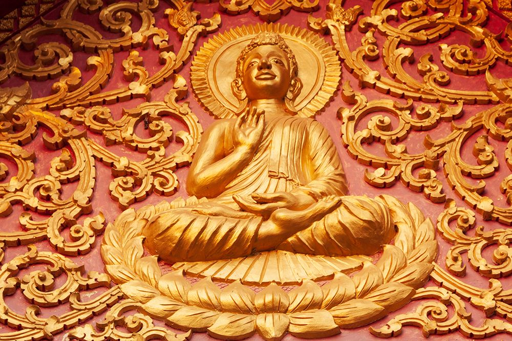 Laos- Luang Prabang. Golden relief carving of Buddha. art print by Tom Haseltine for $57.95 CAD