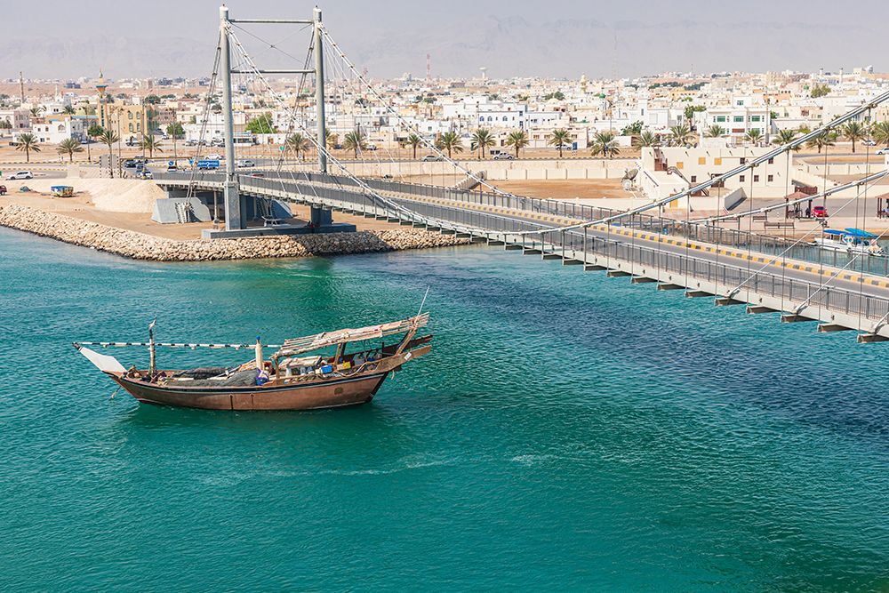 Middle East-Arabian Peninsula-Oman-Al Batinah South-Dhow passing under a suspension bridge art print by Emily Wilson for $57.95 CAD