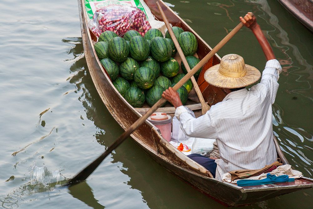 Damnoen Saduak Floating Market-Bangkok-Thailand-Man with a boatload of watermelons for sale art print by Tom Haseltine for $57.95 CAD