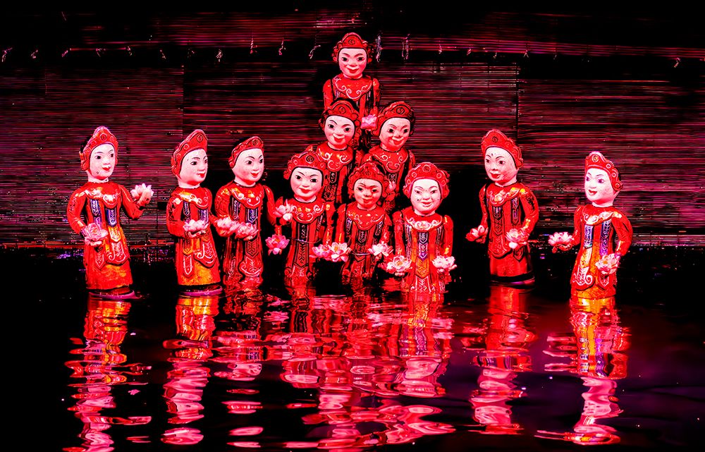 Thang Long Water Puppet Theatre, Hanoi, Vietnam. Portrait of group of water puppets. art print by Murray McCallum for $57.95 CAD