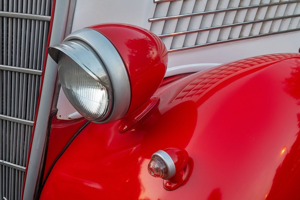 Detail of head lamp on red classic American Ford in Habana-Havana-Cuba art print by Janis Miglavs for $57.95 CAD