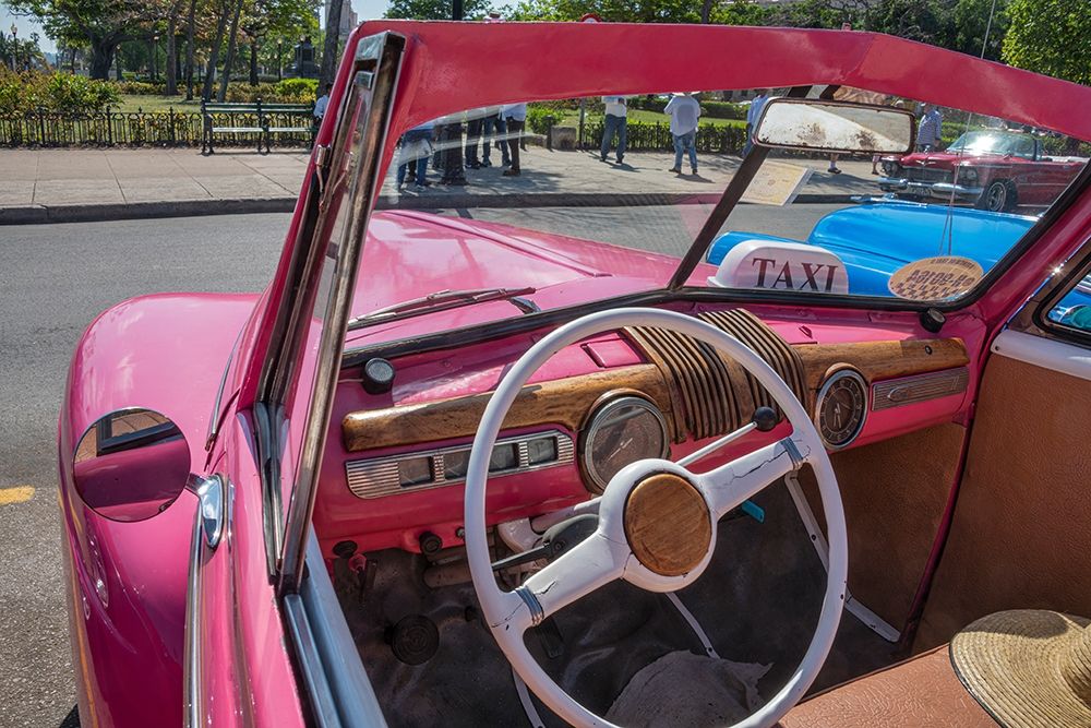 View into drivers seat of classic convertible pink American car parked in Vieja-Havana-Cuba art print by Janis Miglavs for $57.95 CAD