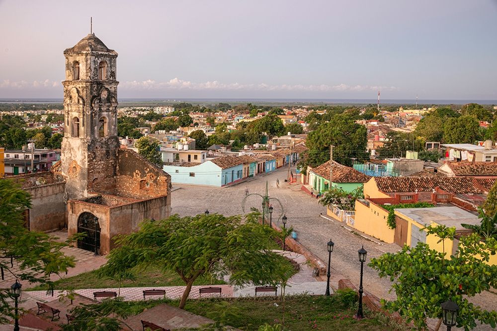 Morning hillside view of Santa Ana church-the plaza-Trinidad streets and the ocean-Cuba art print by Janis Miglavs for $57.95 CAD