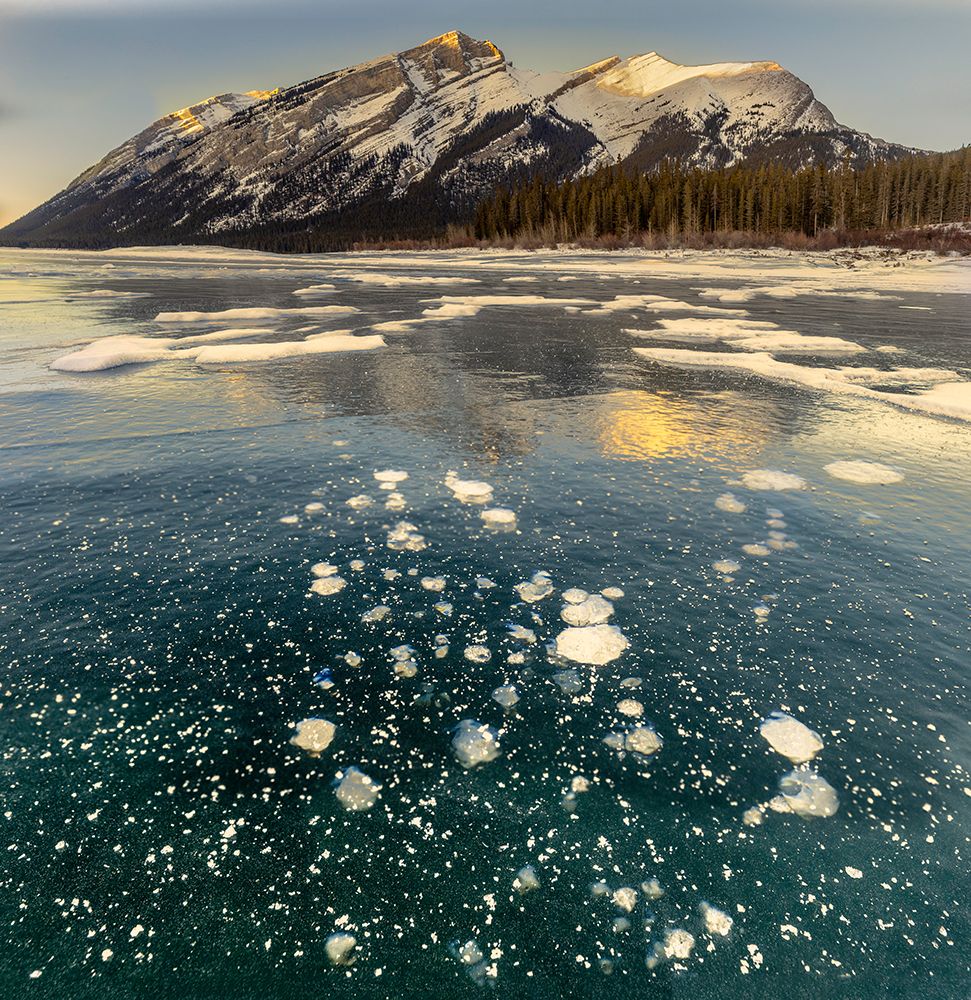 Ice Bubbles, Lake Minnewanka, Canada art print by John Ford for $57.95 CAD