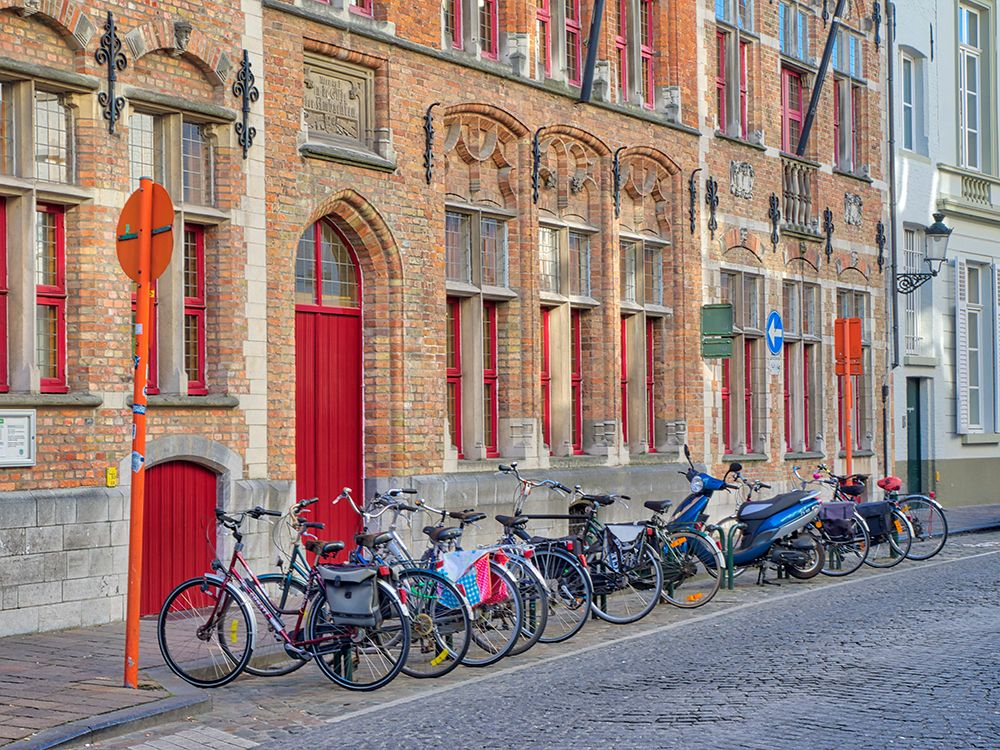 Belgium-Brugge. Bicycles parked along the street. art print by Julie Eggers for $57.95 CAD