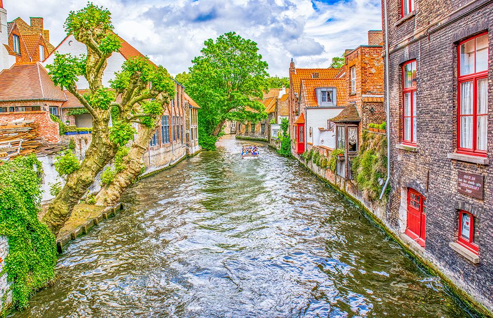 Bruges, Belgium. Famous tourist attraction, canals, cobbled streets and medieval buildings, . art print by Murray McCallum for $57.95 CAD
