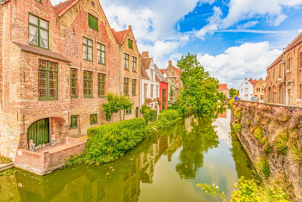 Bruges, Belgium. City known for Its canals, cobbled streets and medieval buildings. art print by Murray McCallum for $57.95 CAD