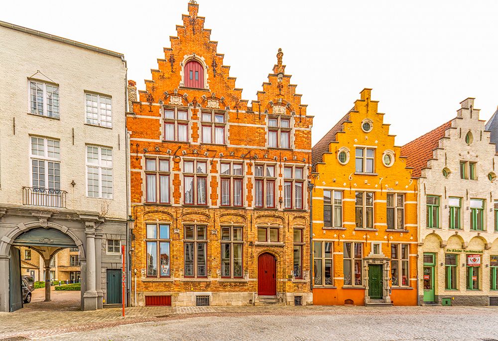 Bruges, Belgium. City known for Its canals, cobbled streets and medieval buildings. art print by Murray McCallum for $57.95 CAD