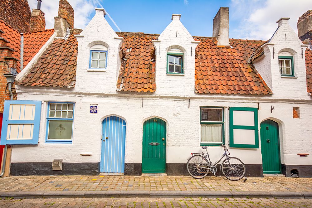 Bruges, Belgium. City known for Its canals, cobbled streets and medieval buildings. art print by Murray McCallum for $57.95 CAD