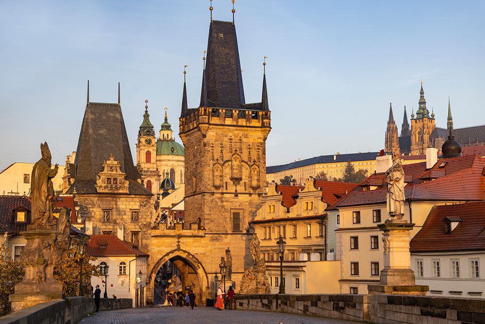Arch of Lesser Town Bridge Tower on Charles Bridge with St. Nicholas Church in Prague. art print by Chuck Haney for $57.95 CAD