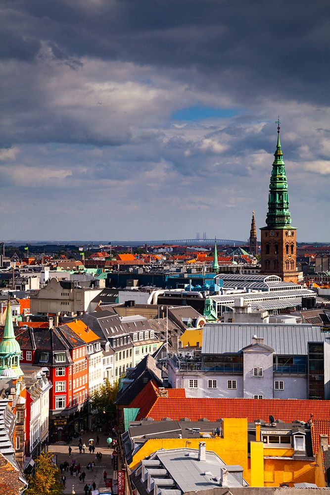 Christiansborg Palace tower and NASDAQ Copenhagen. Oresund Bridge in distance, Copenhagen, Denmark. art print by Rob Casey for $57.95 CAD