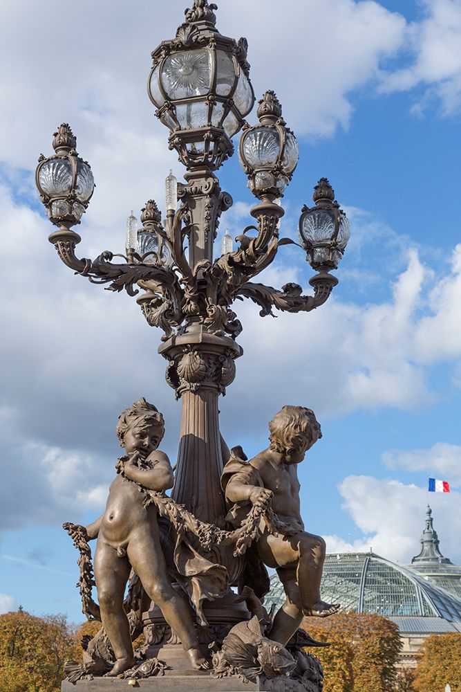 Paris. Decorative street lamps- at Pont Alexandre III- along River Seine. art print by Emily Wilson for $57.95 CAD