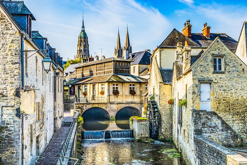 Colorful old buildings- Aure River reflection- Bayeux- Normandy- France art print by William Perry for $57.95 CAD