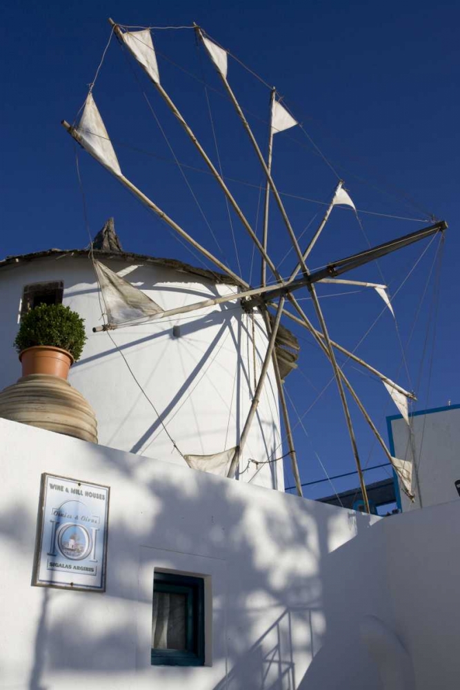 Greece, Santorini Windmill against blue sky art print by Bill Young for $57.95 CAD