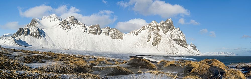 Coastal landscape with dunes at iconic Stokksnes during winter and stormy conditions Iceland art print by Martin Zwick for $57.95 CAD