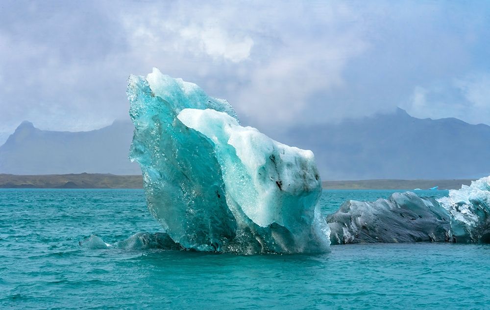 Blue-large iceberg Diamond Beach Jokulsarlon Glacier Lagoon Vatnajokull National Park art print by William Perry for $57.95 CAD