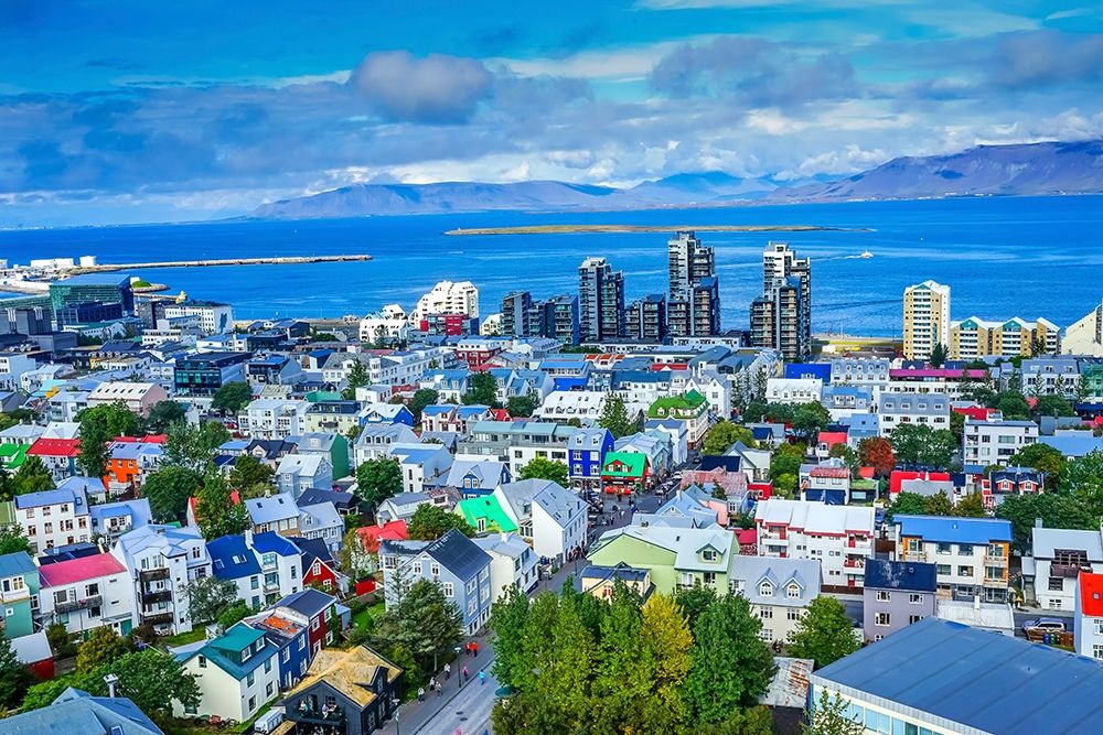Colorful red green blue Houses Apartment Buildings Cars Bus Streets Ocean-Reykjavik-Iceland art print by William Perry for $57.95 CAD