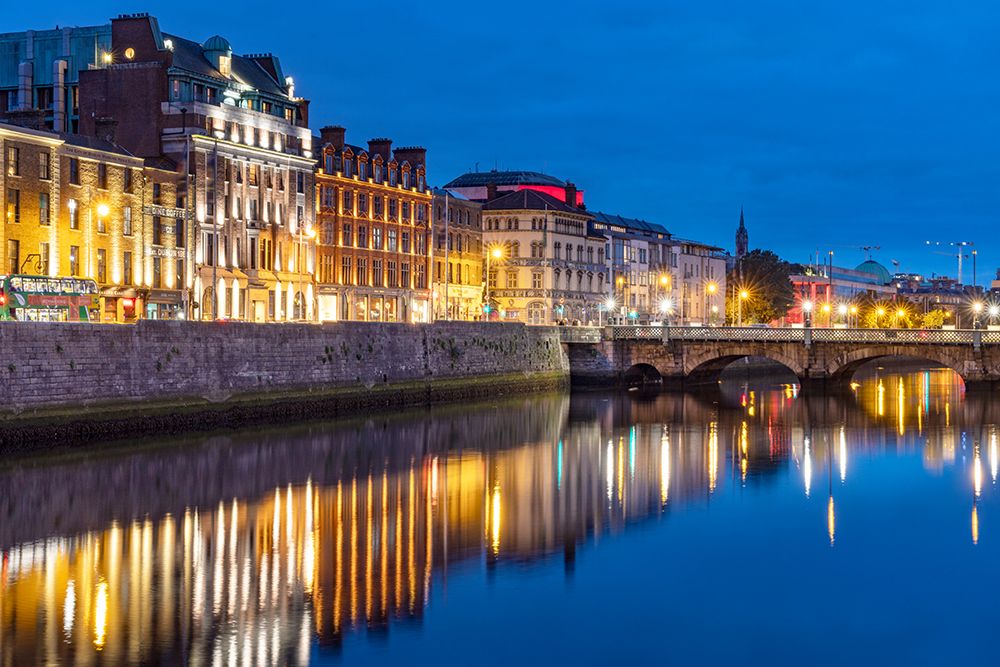 Dusk along Wellington Quay and the River Liffey in downtown Dublin-Ireland art print by Chuck Haney for $57.95 CAD
