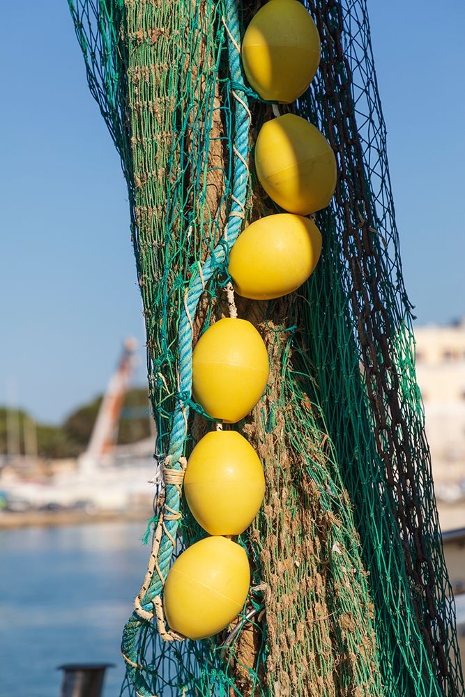 Italy-Apulia-Province of Barletta-Andria-Trani-Trani Close-up of fishing net and floats art print by Emily Wilson for $57.95 CAD