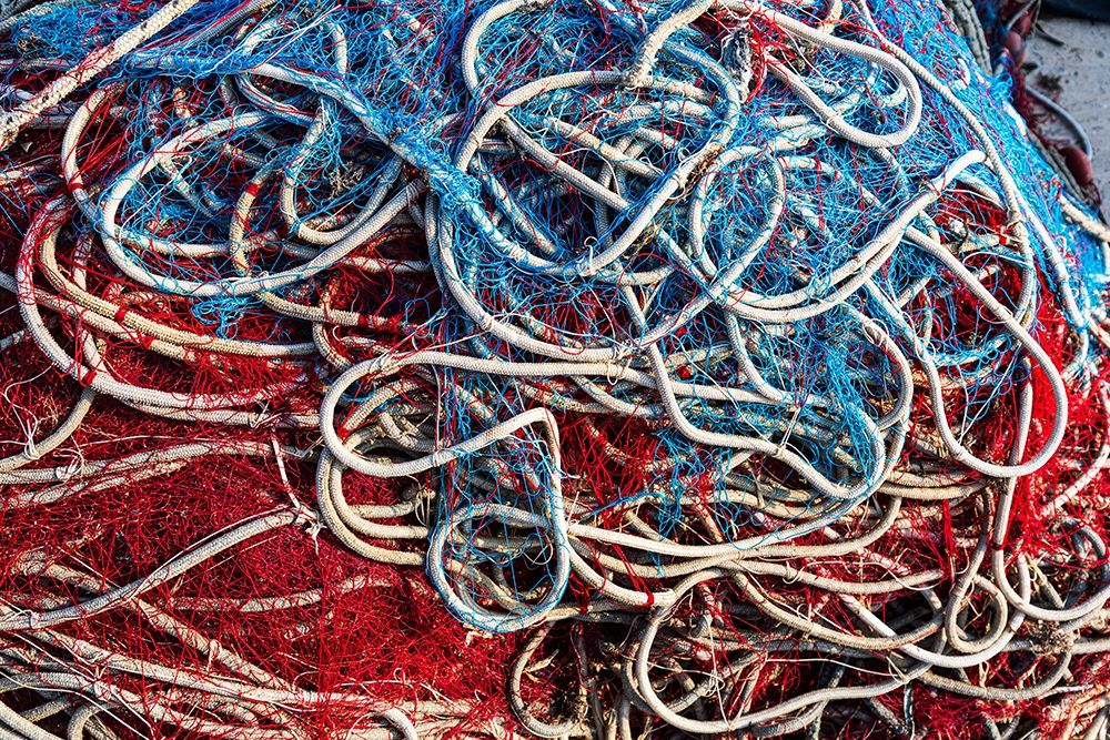 Italy-Apulia-Province of Lecce-Gallipoli Texture detail of fishing nets in red-white-and blue art print by Emily Wilson for $57.95 CAD