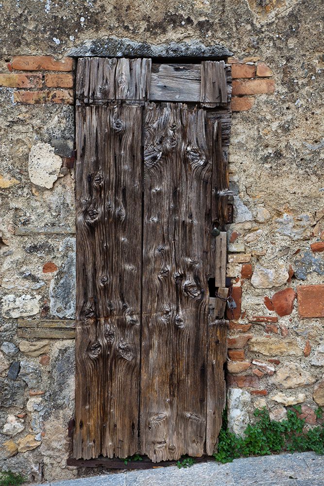 Italy-Tuscany-Monteriggioni Old doorway in the walled town of Monteriggioni art print by Julie Eggers for $57.95 CAD