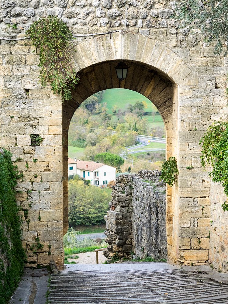 Italy-Chianti-Monteriggioni Looking out an arched entrance into the walled town art print by Julie Eggers for $57.95 CAD